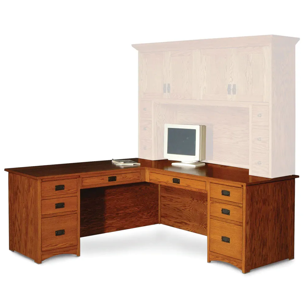 A wooden desk with a computer on top of it.