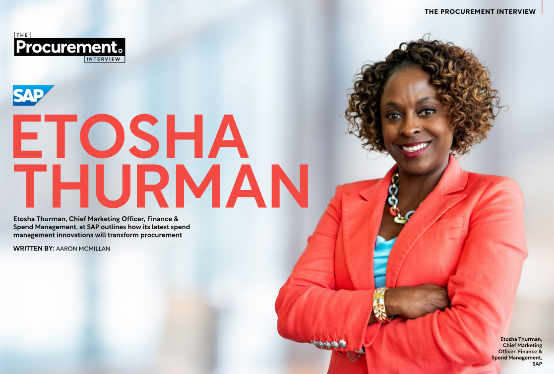 Etosha Thurman, smiling in red blazer, for The Procurement Magazine.