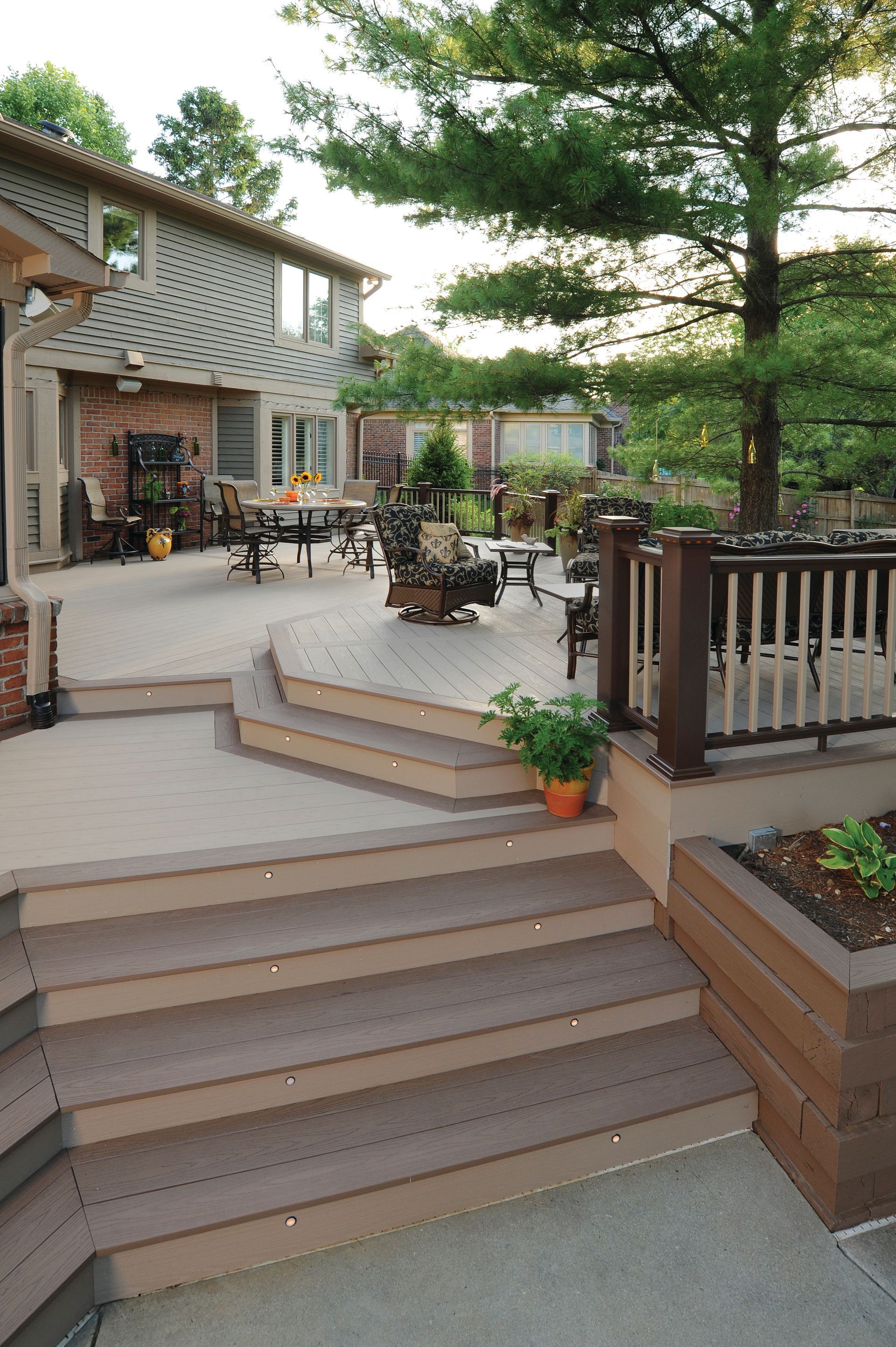 A large deck with stairs leading up to it