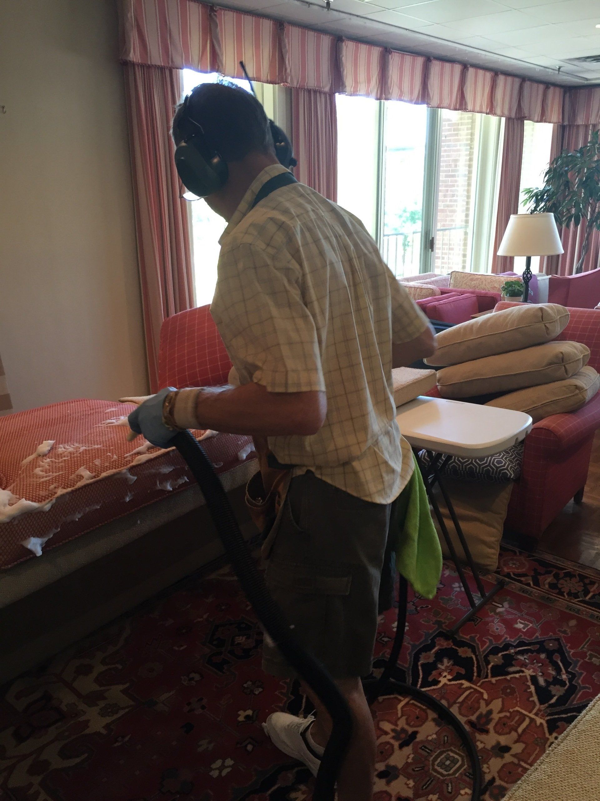 Virginia —  Man Cleaning Sofa in Charlottesville, VA