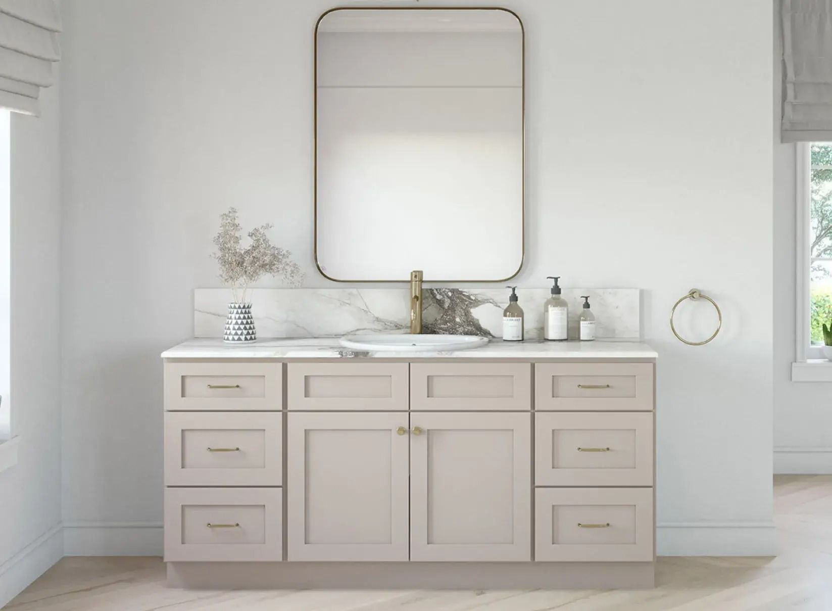 Bathroom vanity with neutral cabinets, marble countertop, large mirror, and gold fixtures.