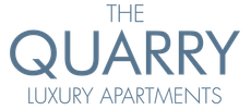 Logo for "The Quarry Luxury Apartments" in blue font.
