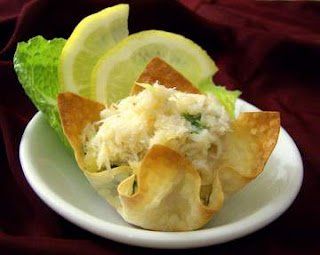 Scrumptious crab bites with flaked crabmeat, white wine and flavors of creole essence.