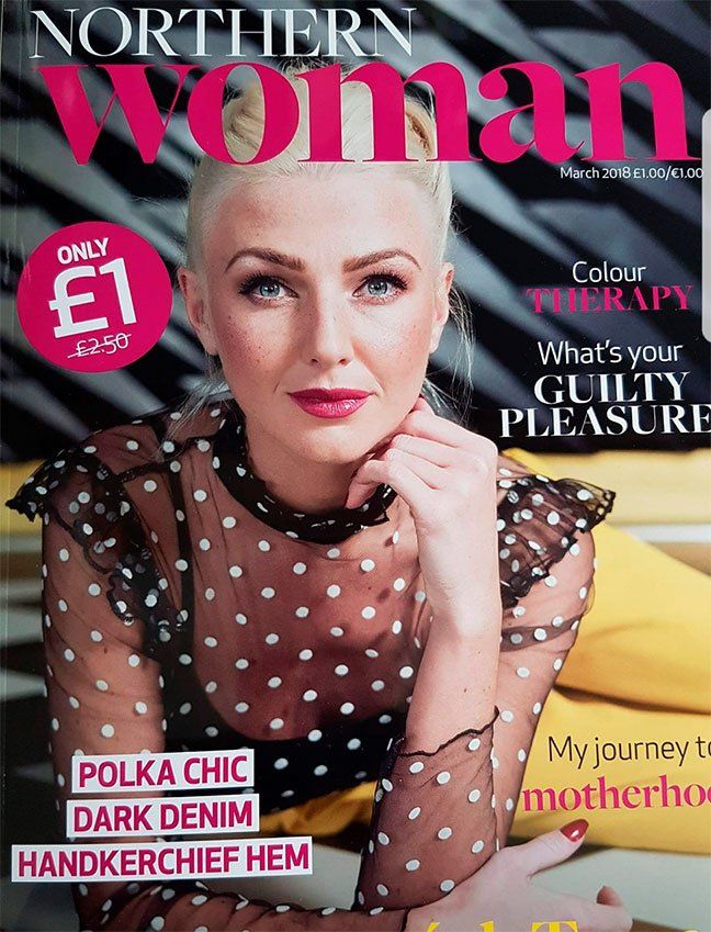 Northern Woman cover with woman with pink lips and black netted polka dot dress
