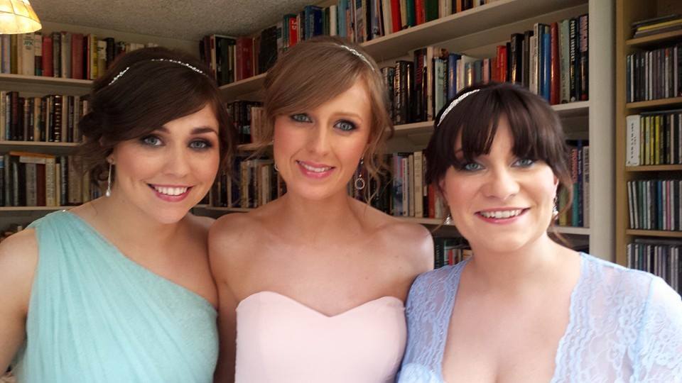 Bridesmaids smiling for camera