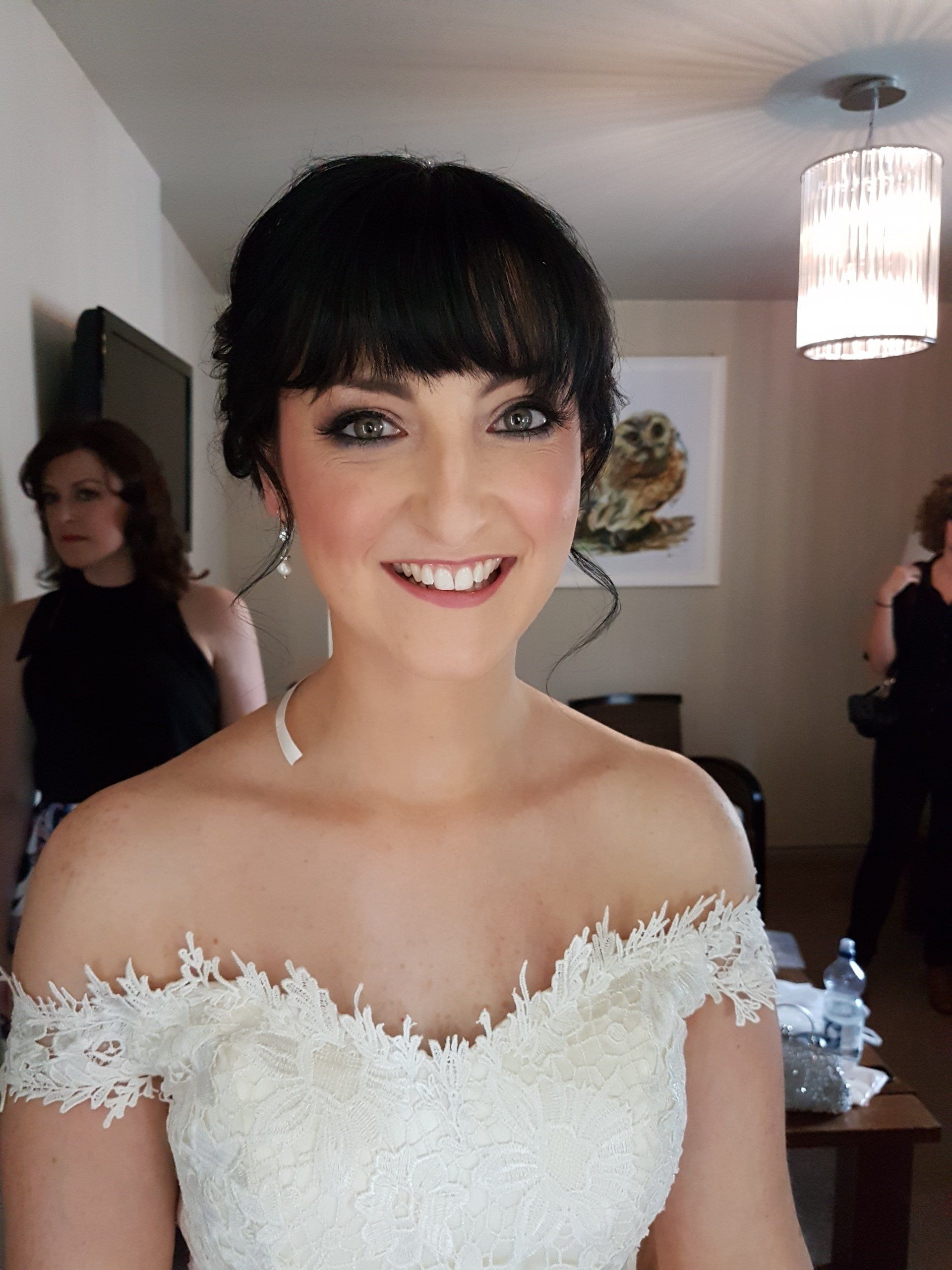 Young bride with dark hair and subtle make-up