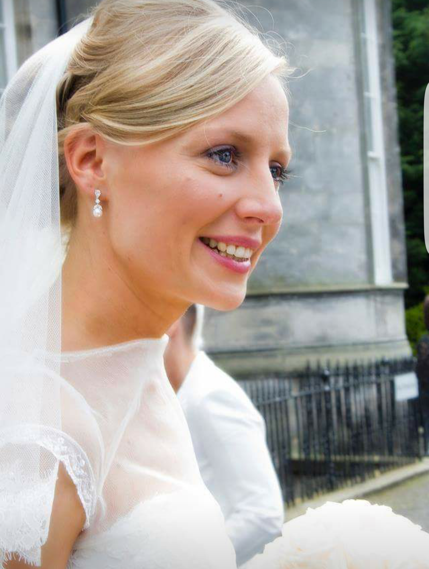 Side view of blonde smiling bride