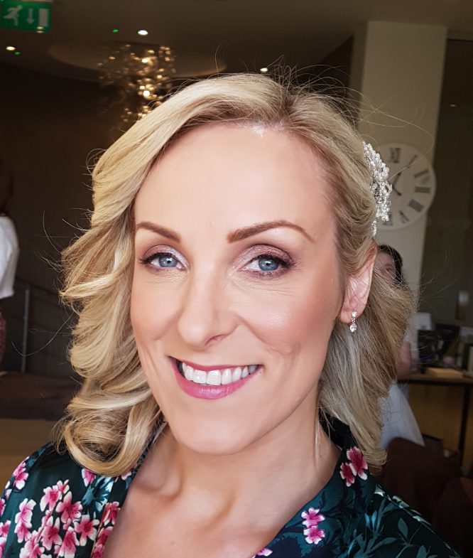 Bride smiling at camera