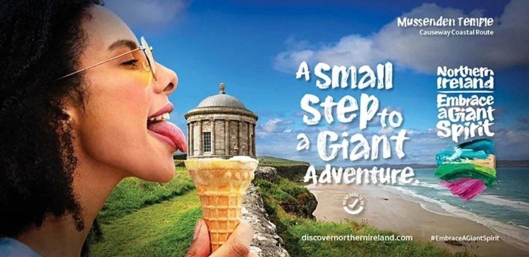 Ad with woman licking cone with structure on top instead of ice cream