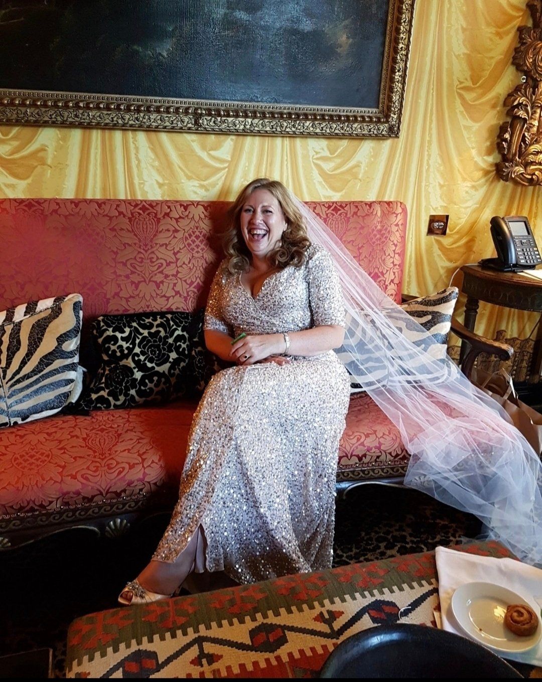 Bride in dress sitting down
