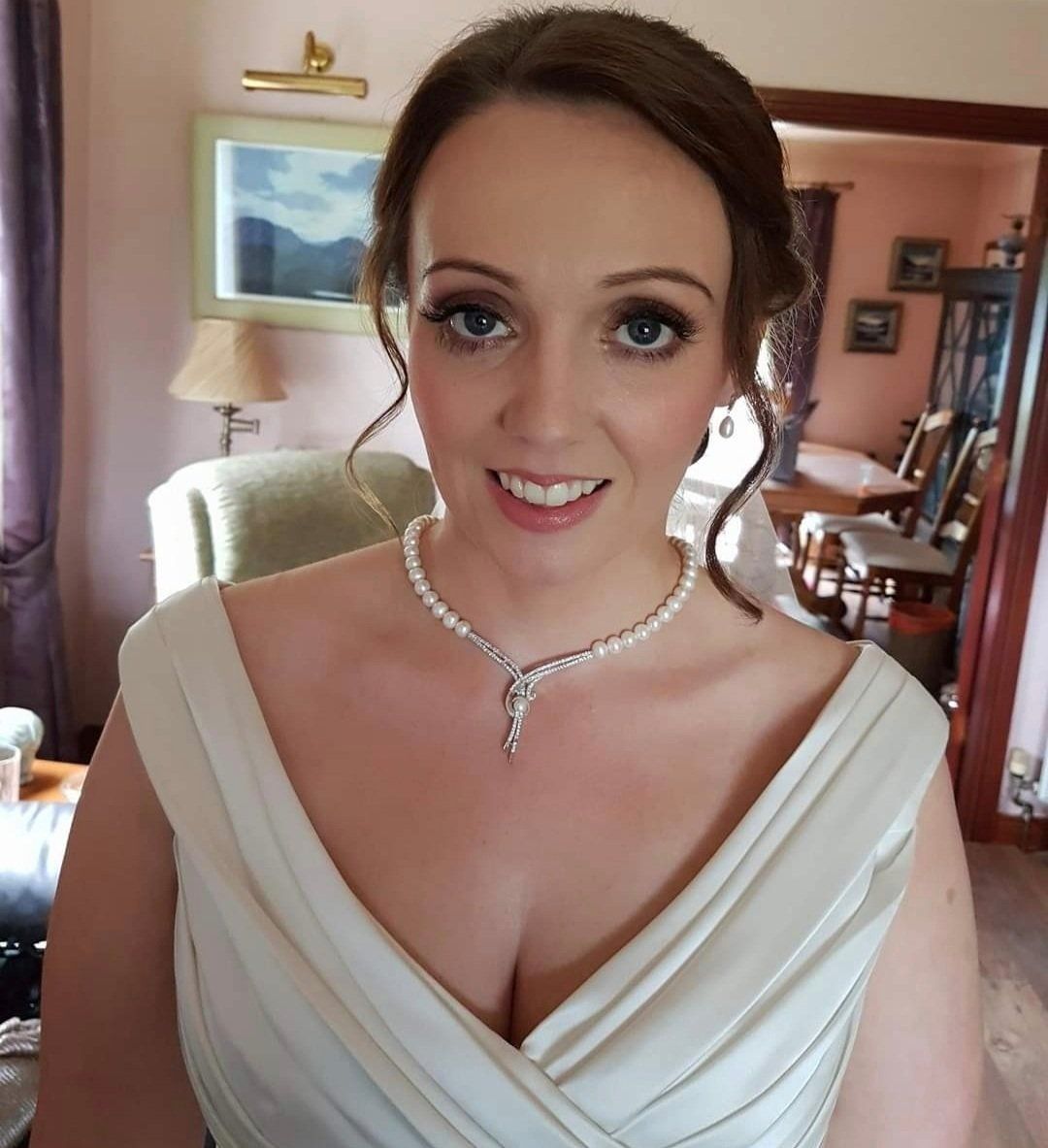 Woman smiling and looking up at camera