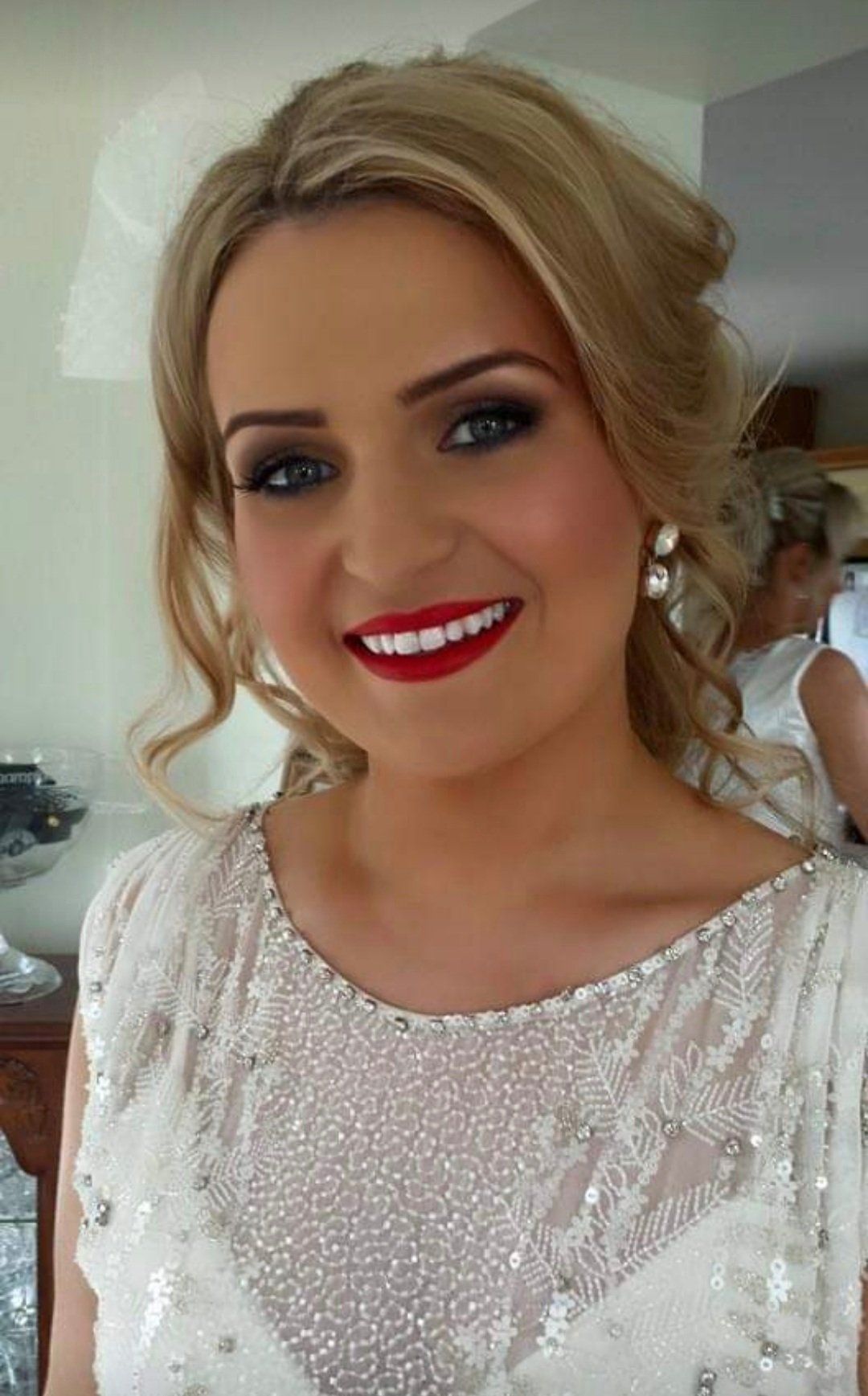 Happy blonde smiling at camera