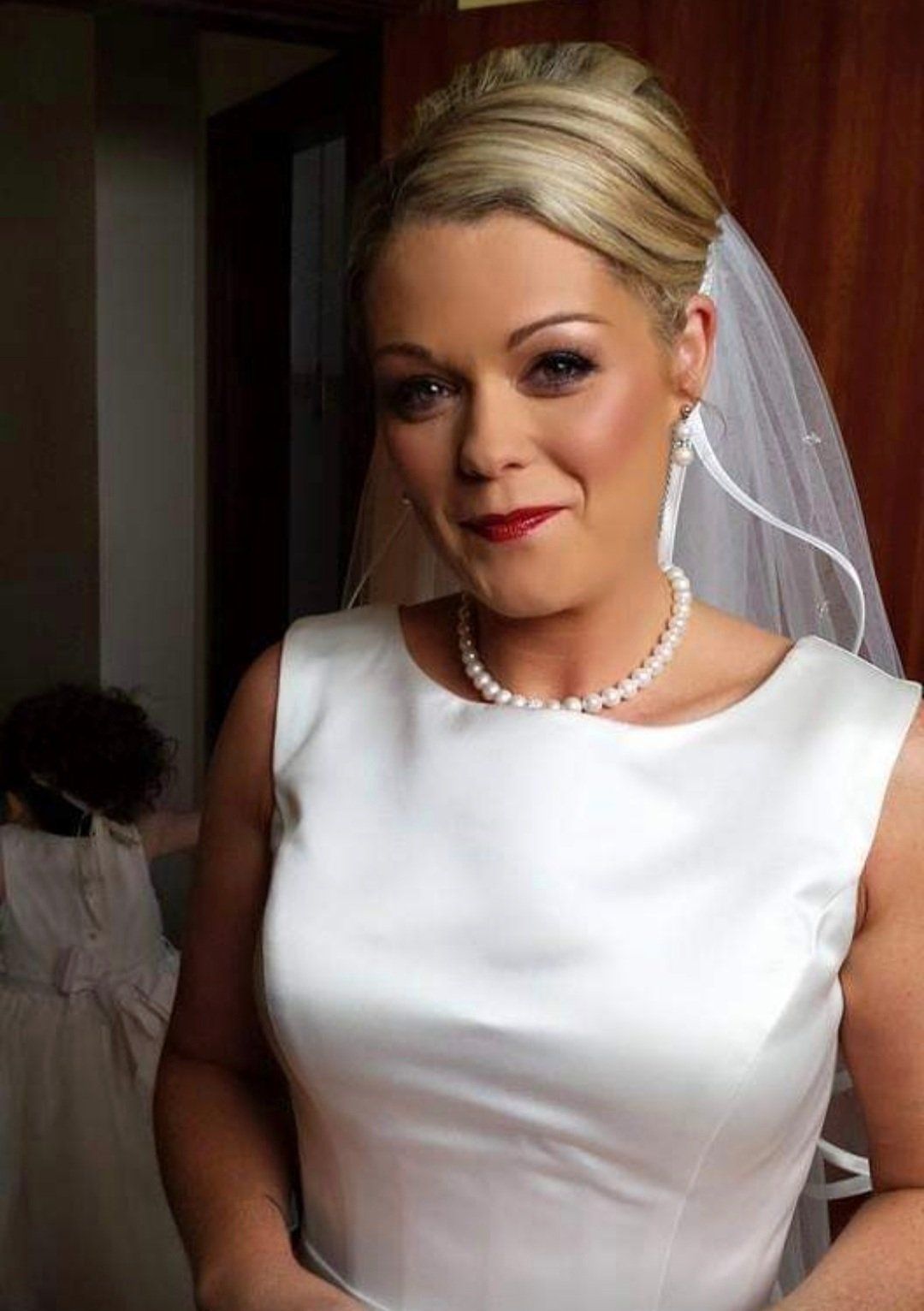 Bride smiling at camera