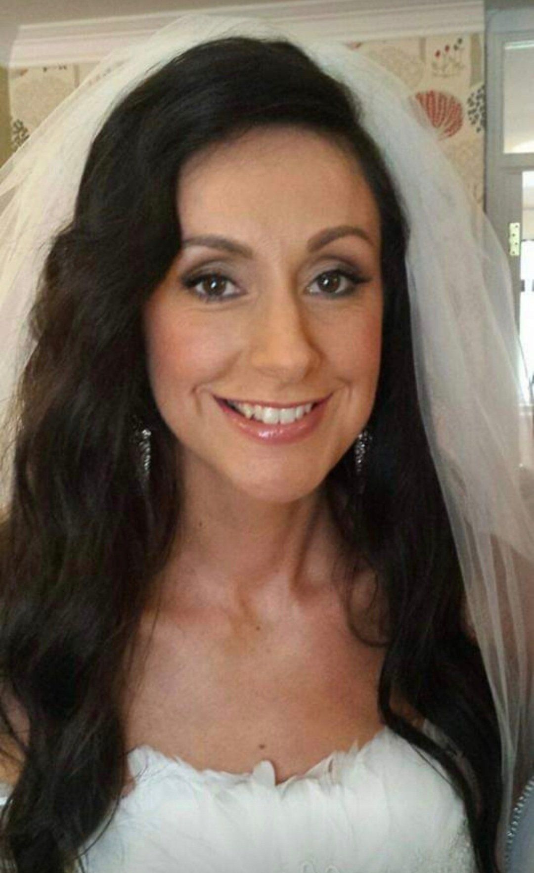 Bride smiling at camera