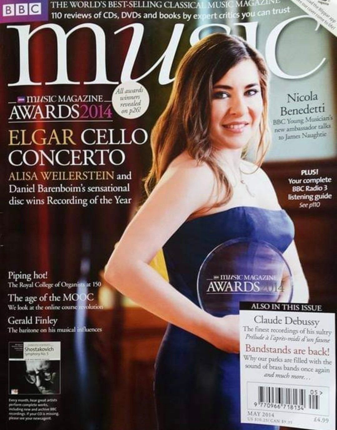 Music magazine cover with woman wearing blue dress and smiling at camera