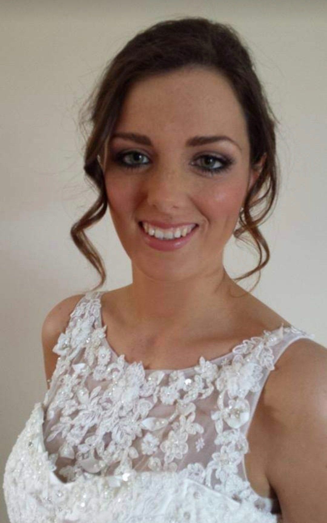 Bride smiling at camera