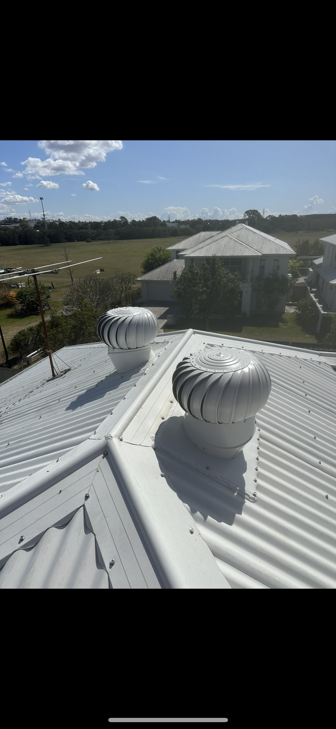 Two Whirlybird On A White Metal Roof — Whirly Bird King in Buderim, QLD