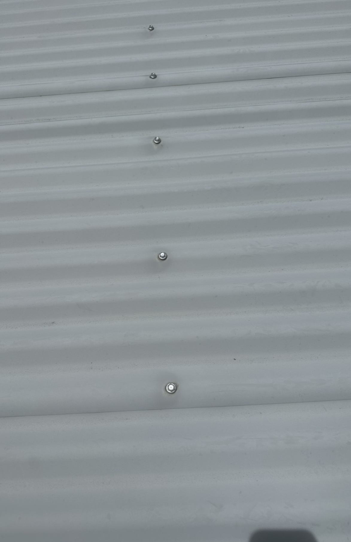 Metal Roof that has been re-screwed — Whirly Bird King in Buderim, QLD