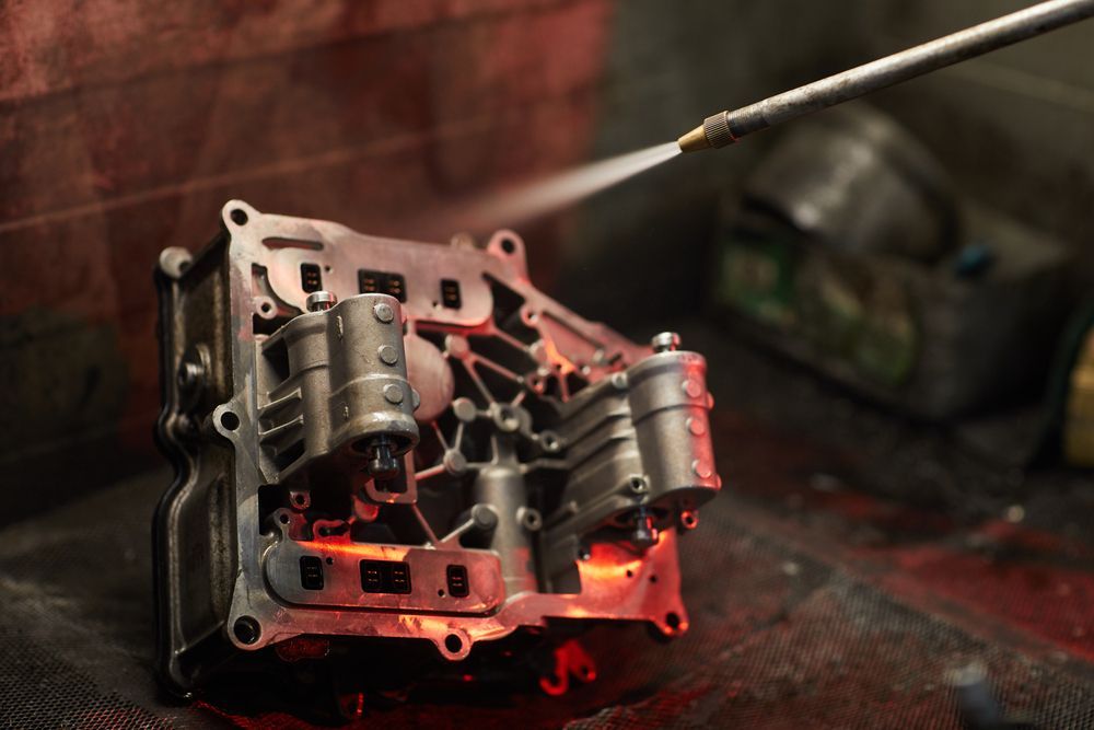 A Transmission Component Being Sprayed — LM Engineering In Normanton, QLD