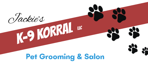 The logo for jackie 's k-9 korral llc pet grooming and salon
