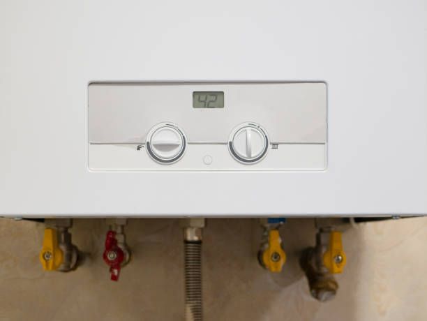 White boiler with digital display showing 