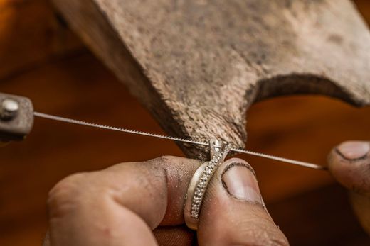 Jeweller using a saw | Toowoomba, QLD | Aztec Jewellers & Valuation Services