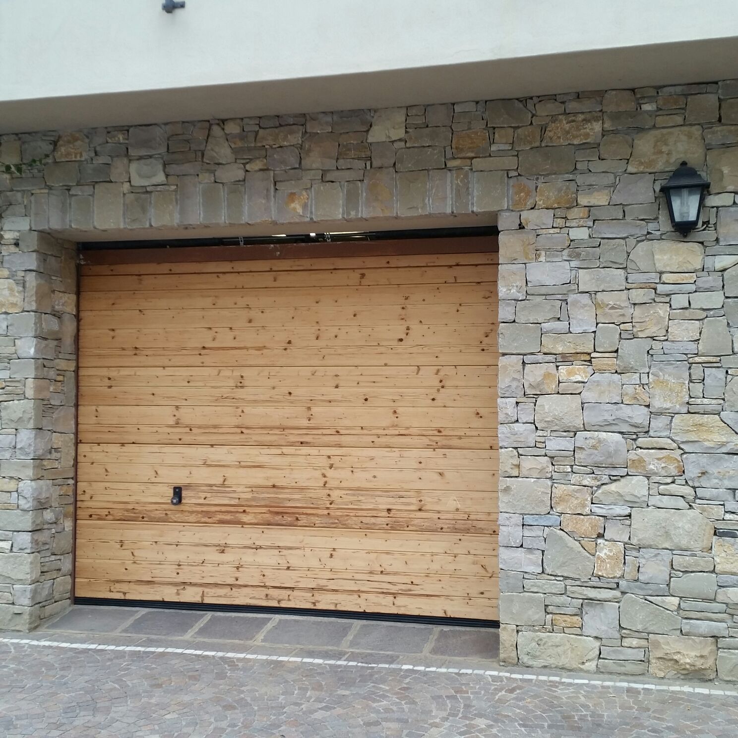 Porta per garage in legno