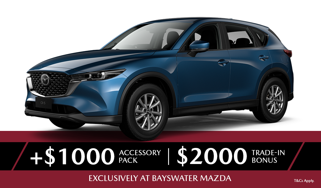 A blue mazda cx-5 is shown on a white background.
