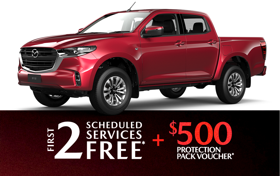 A silver mazda bt50 pickup truck is shown on a white background.