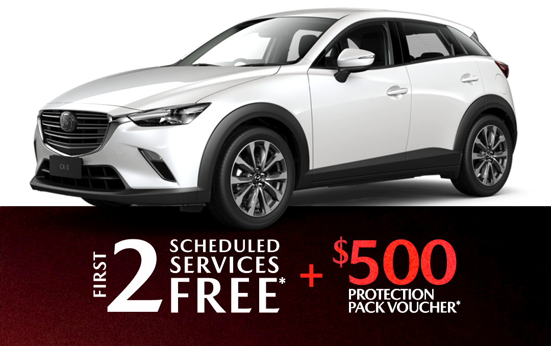 A gray mazda cx 3 is shown on a white background.