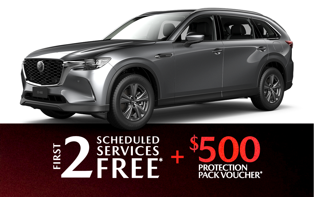 A red car with black wheels is on a white background.