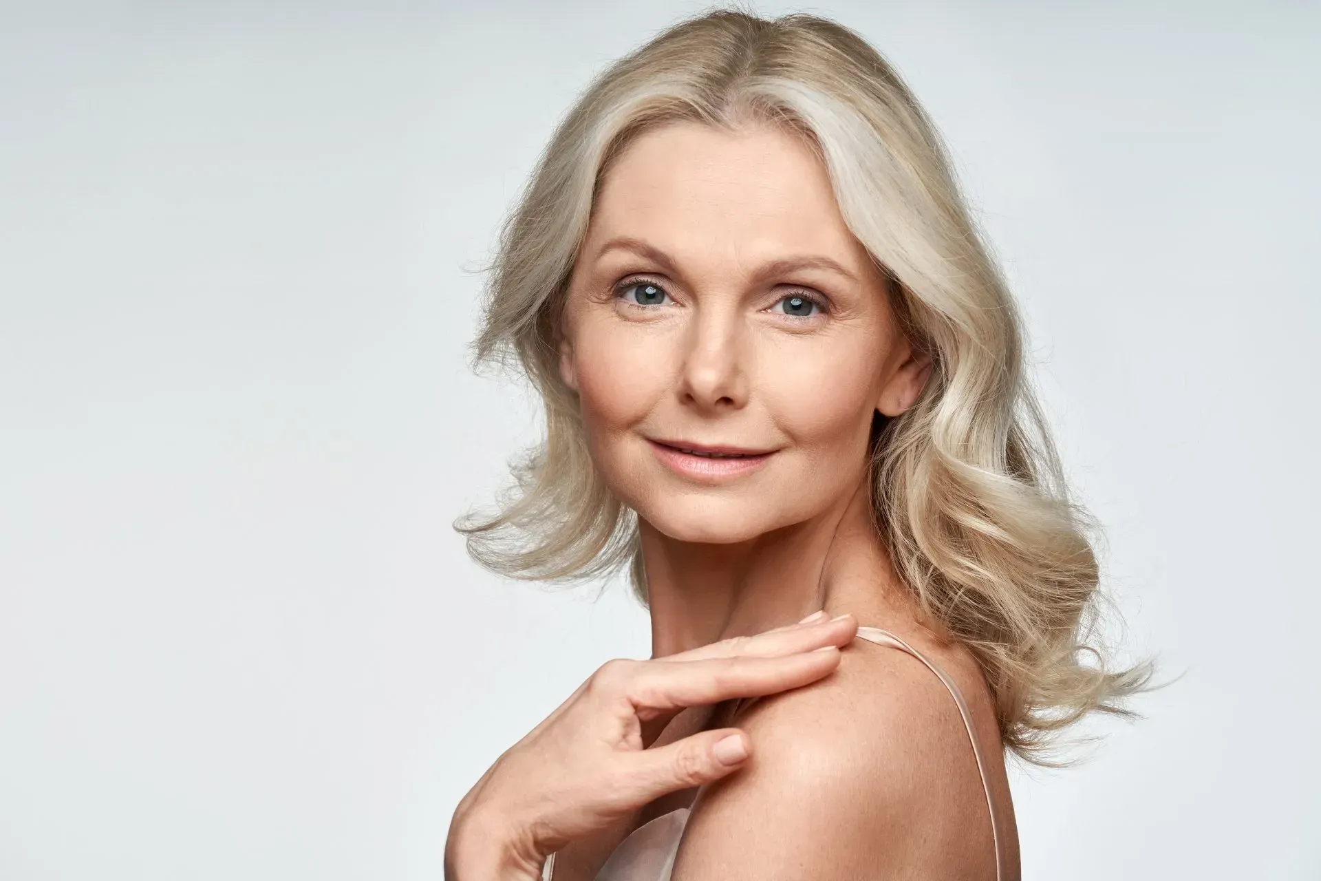 Mature woman with smooth, youthful skin after Botox — anti-aging treatment in Tel Aviv.