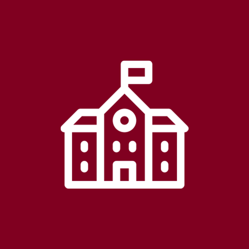 A school building with a flag on top of it on a red background.