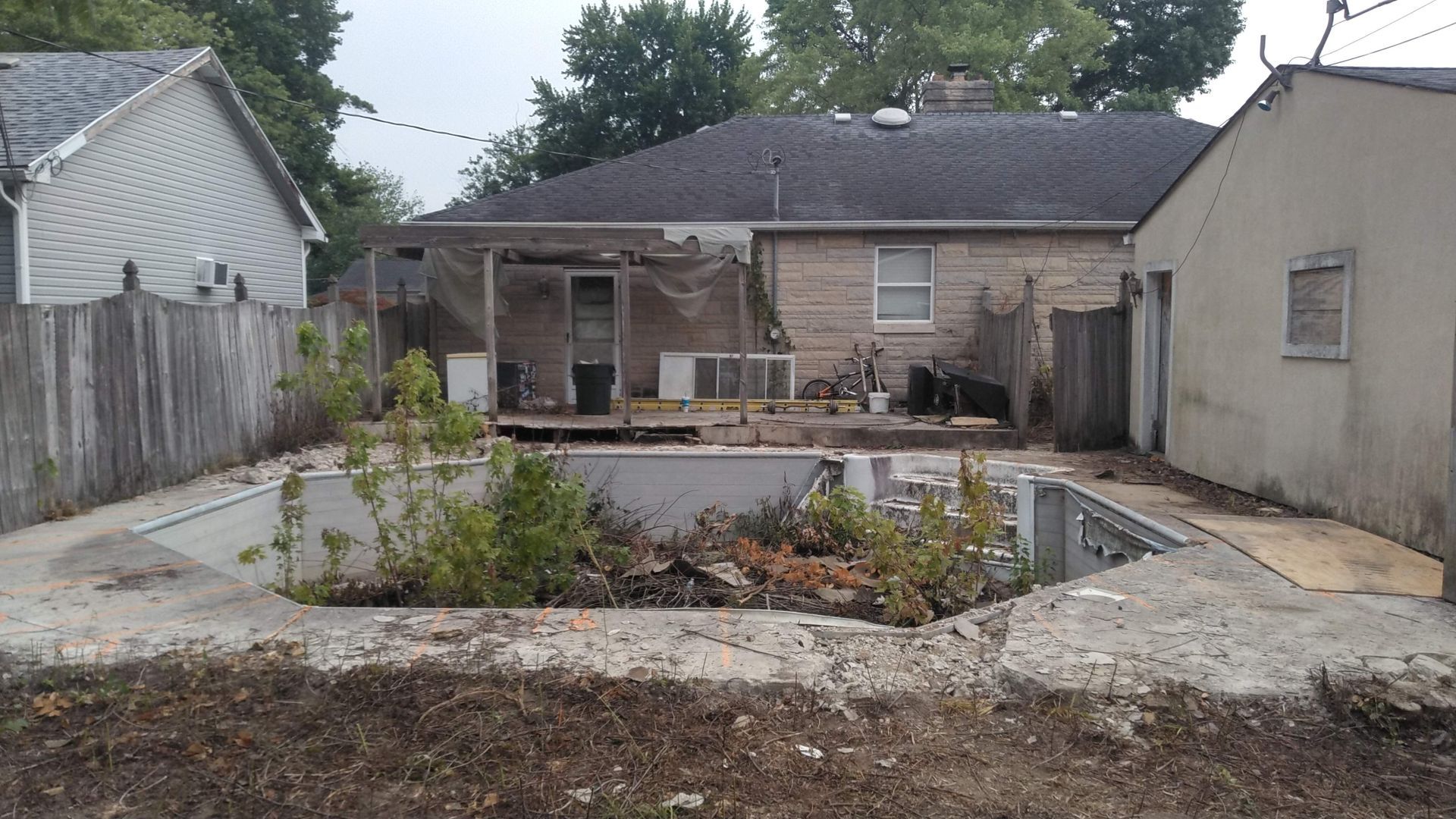 A house with a swimming pool in the backyard