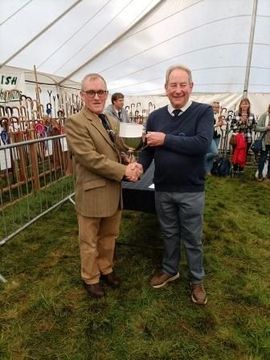 Yetholm Scottish Champion of Champions 2024 Iain Paterson with SCA Chairman Robert Elliot