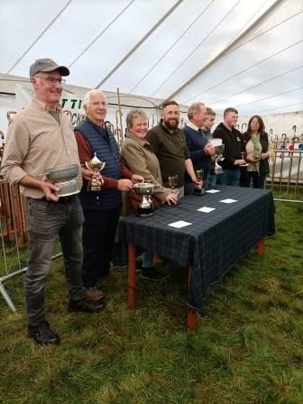 Yetholm Open Show 2024 and Scottish Champion of Champion winners;  Left to Right; David Bowman, Alistair Warwick, Julie Anderson Roskell, Murray Playfair, Iain Patterson, Marty Ritson, ?,  Carol Cook