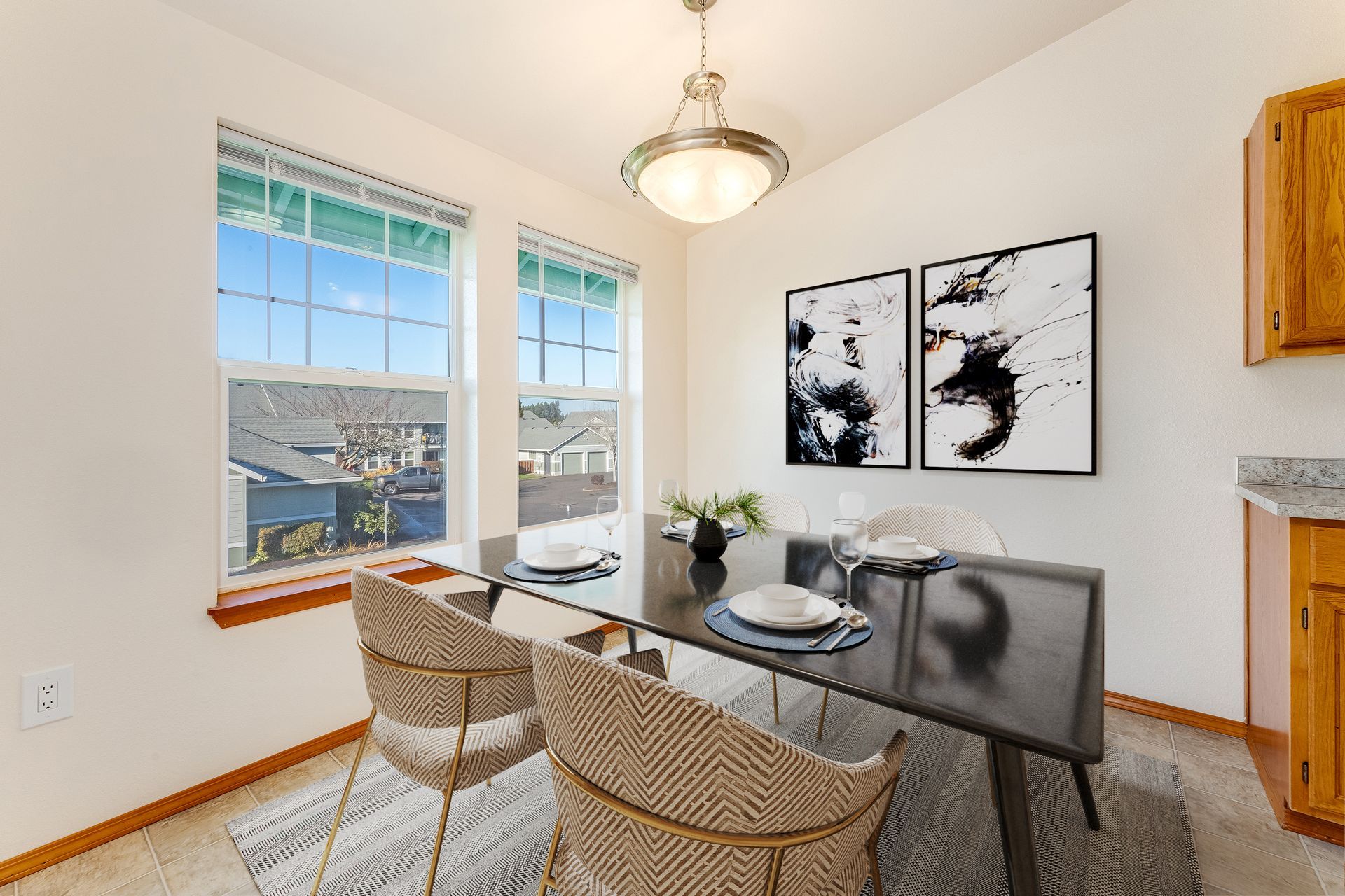 Dining room with two large windows.