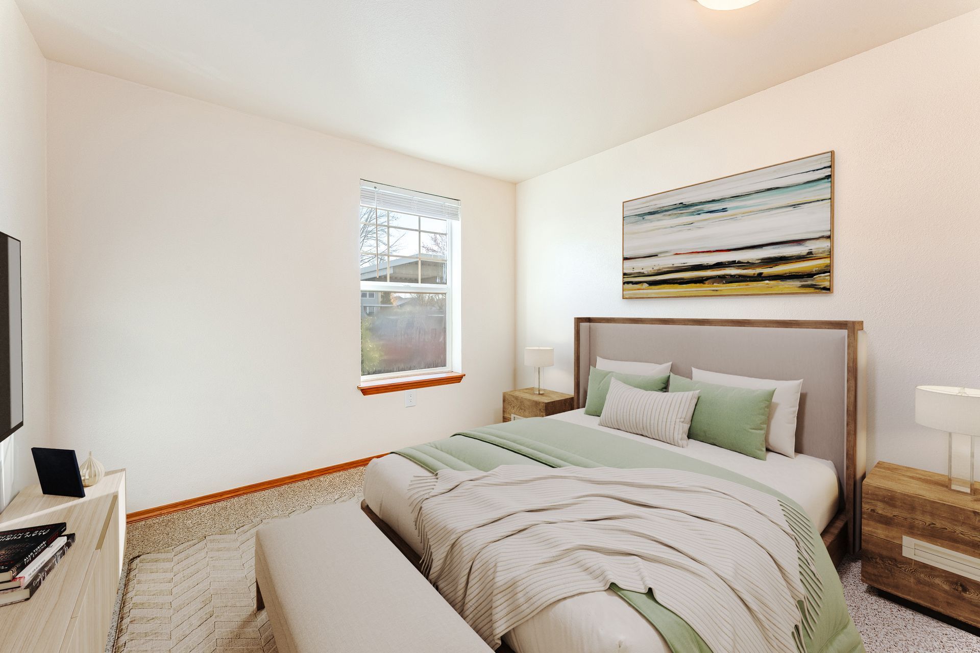 Spacious bedroom with view of window.