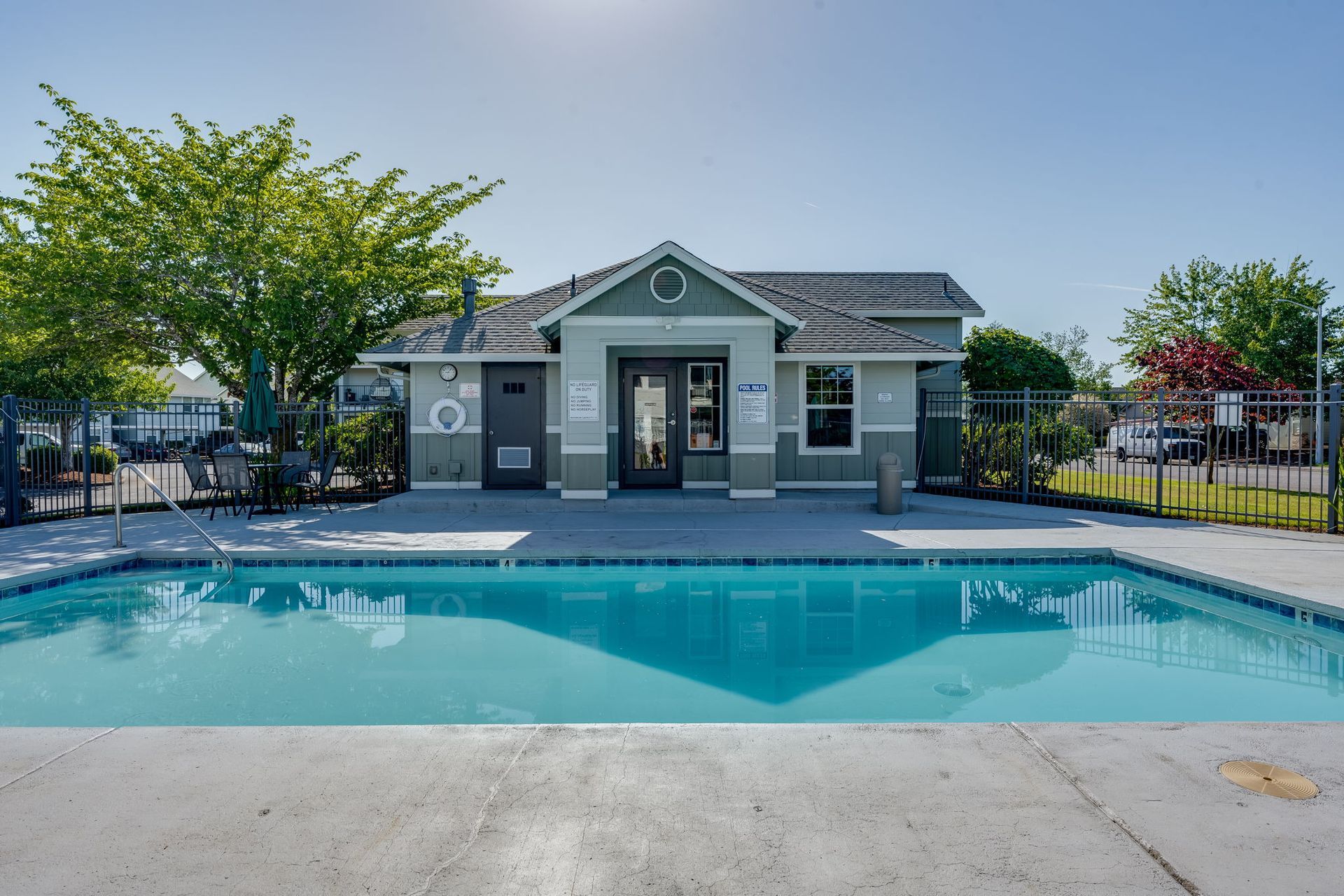 View of pool with clubhouse in the background.