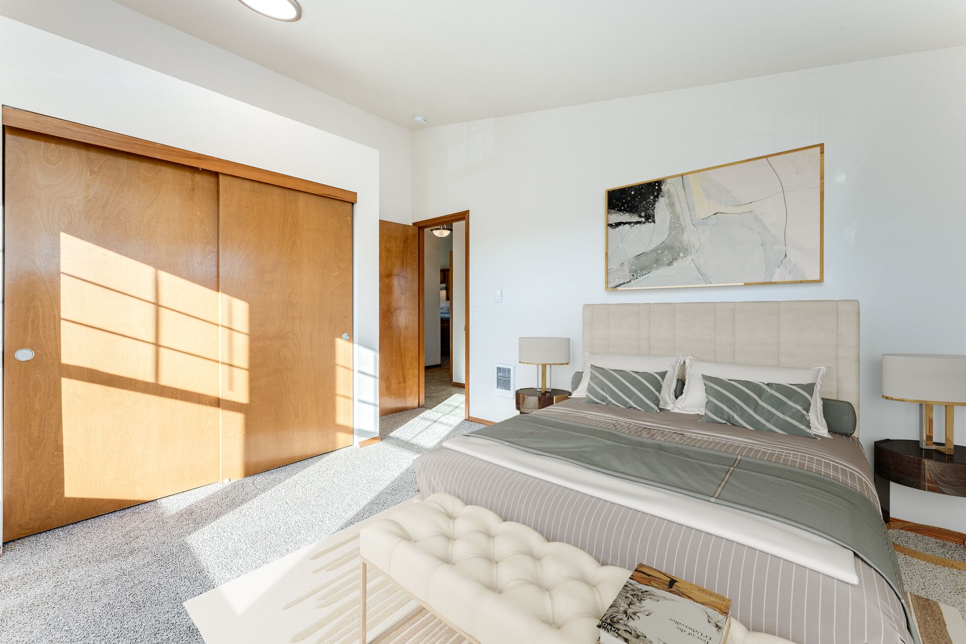 Bedroom two with ample closet space and plenty of light from windows.