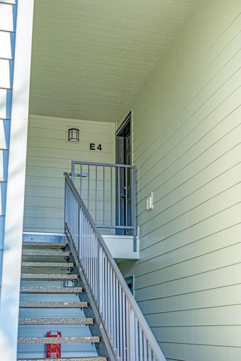 Stairwell going to upstairs apartment.
