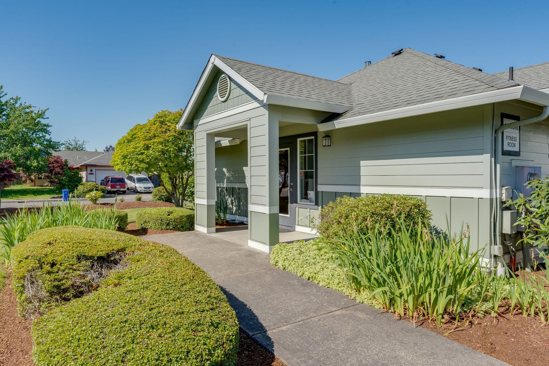 Front of clubhouse which includes recreation room w/ kitchenette and fitness center.