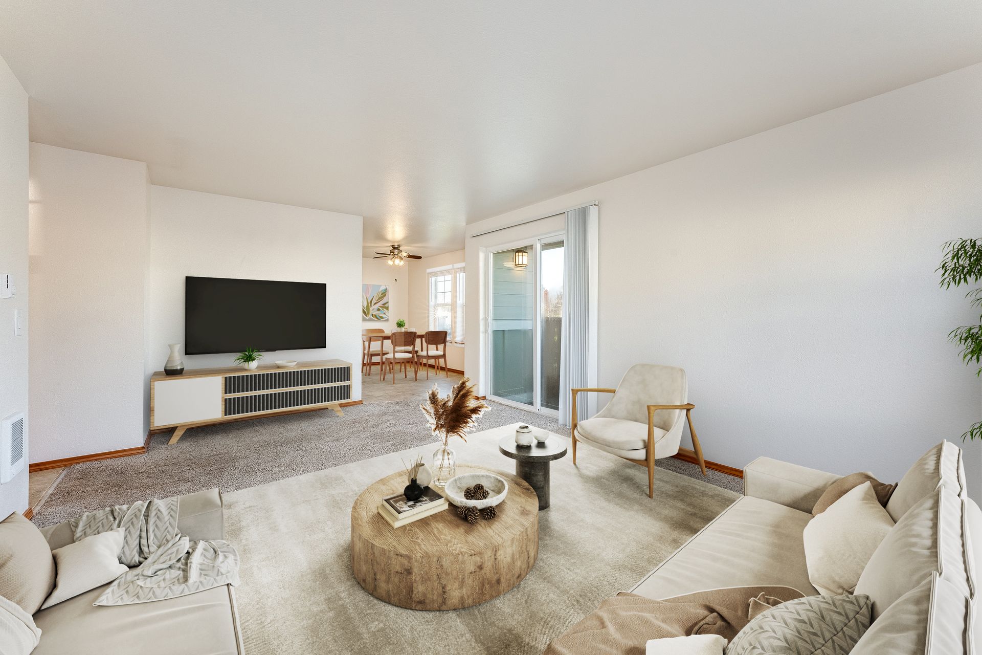 End apartment living room with view of sliding glass door and dining room in the distance.