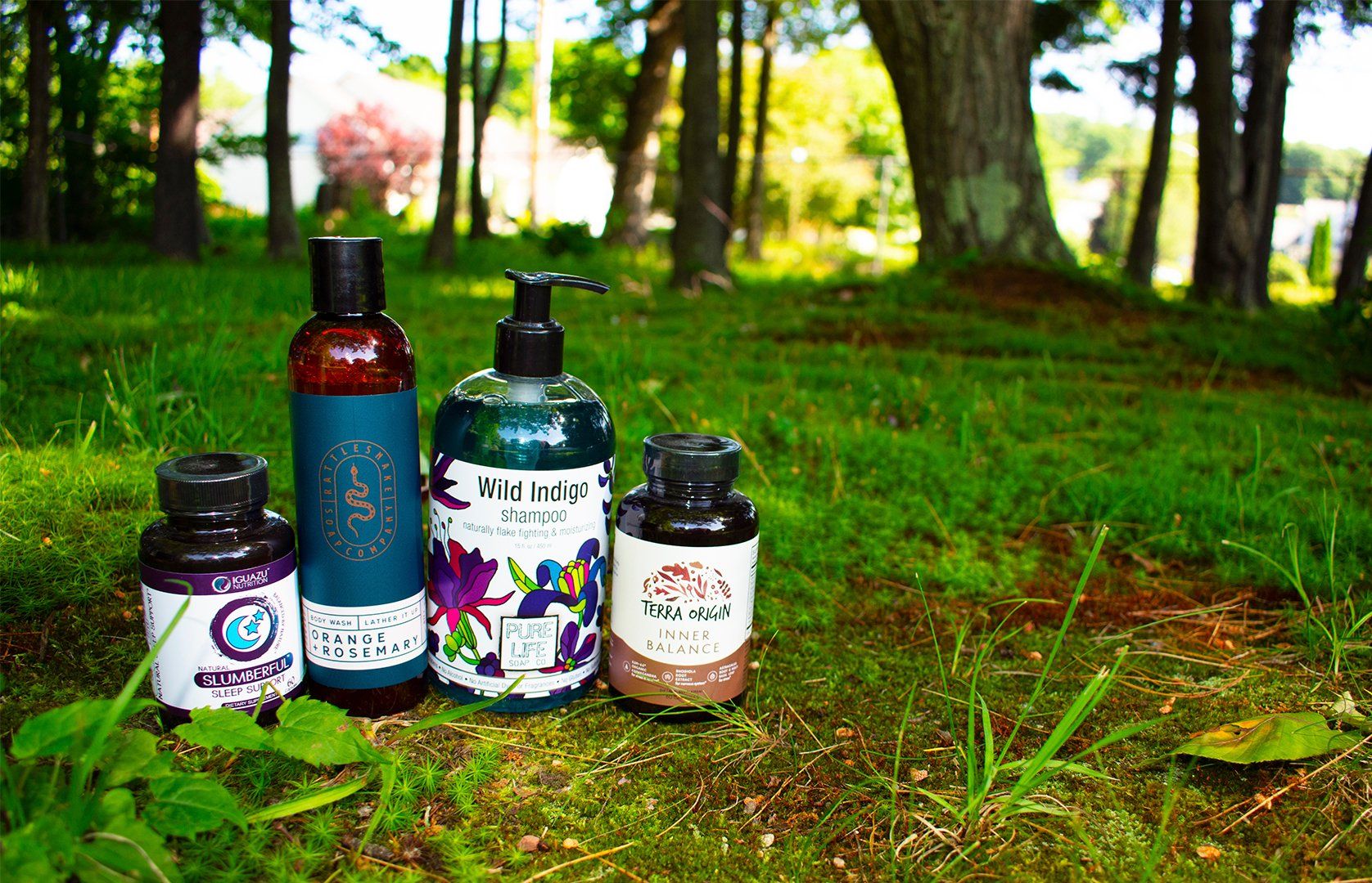 Supplement and health & beauty products on green grass