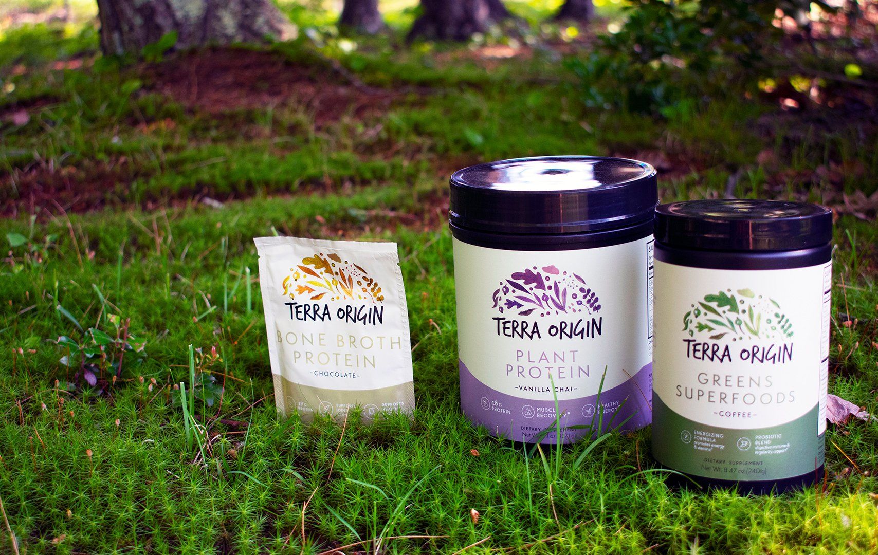 Terra Origin supplement product group on grassy natural background