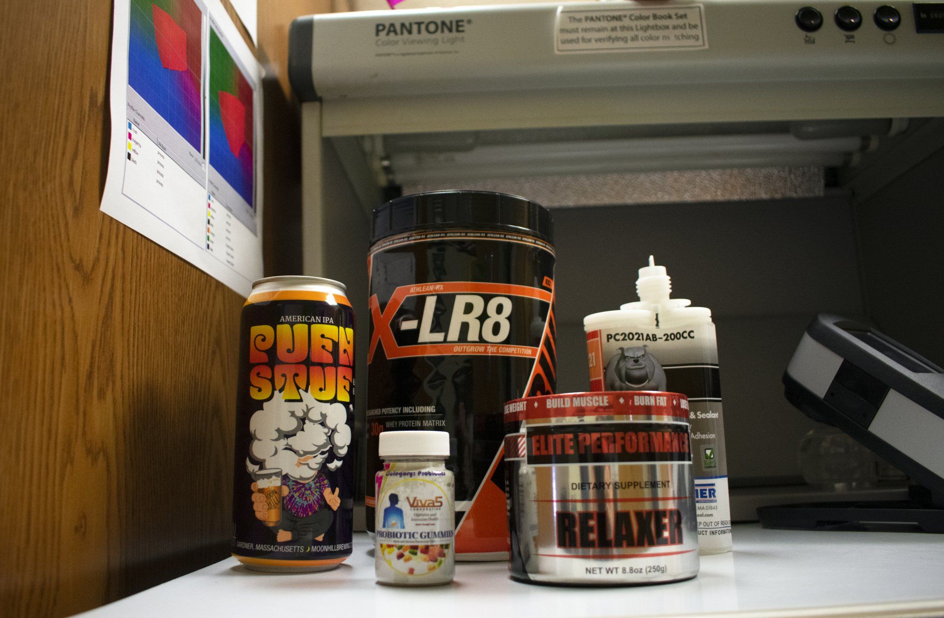Group of various supplement, beer, and industrial products with shrink sleeves