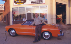 Norm Heiser with Orange Sport Car