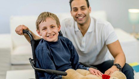 A boy in a wheelchair