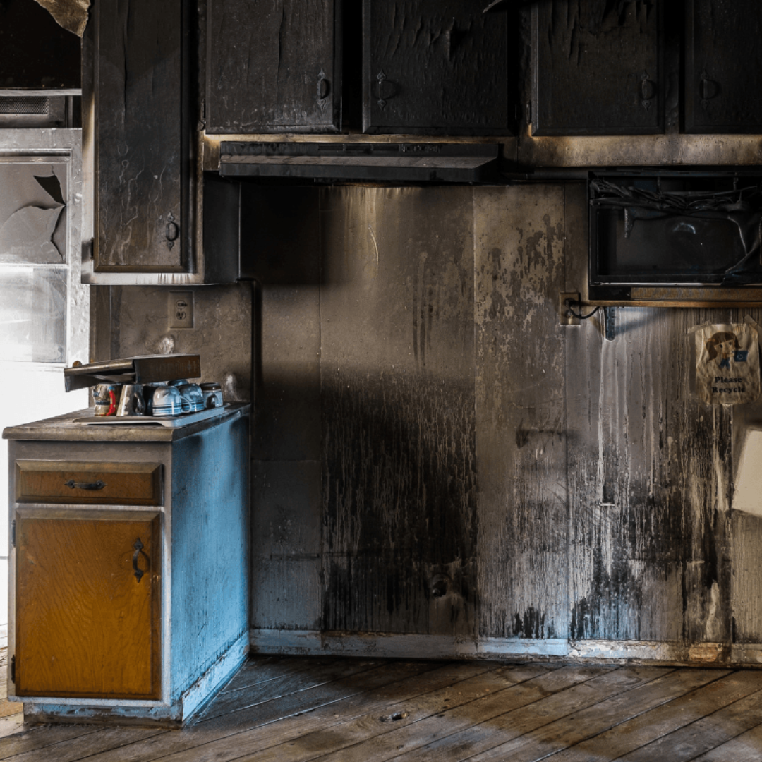 Image of a kitchen affected by fire damage.