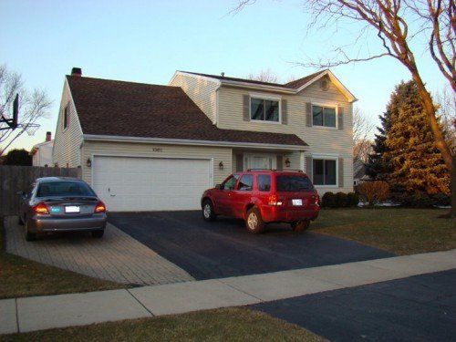 House New Exterior Transformation — Warrenville, IL — D-S Exteriors Inc